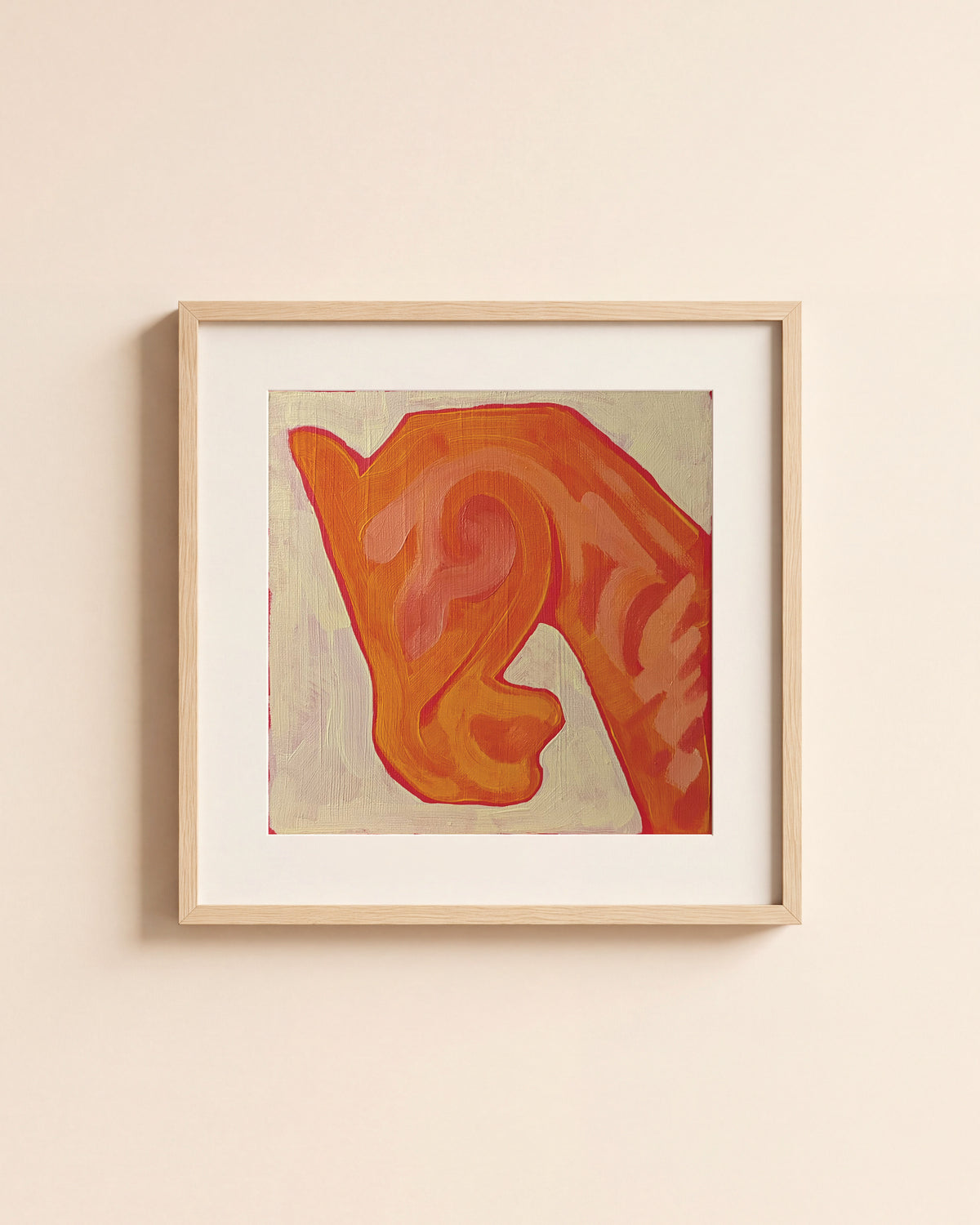 Orange Horse giclée art print in a light oak frame with a white mat, hanging on a cream wall