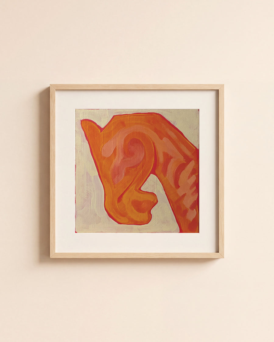 Orange Horse giclée art print in a light oak frame with a white mat, hanging on a cream wall