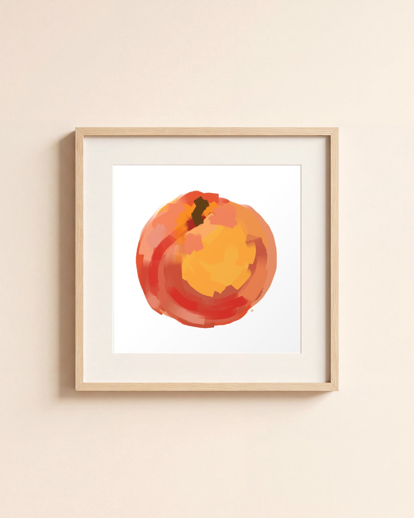 Peach giclée art print in a light oak frame with a white mat, hanging on a cream wall