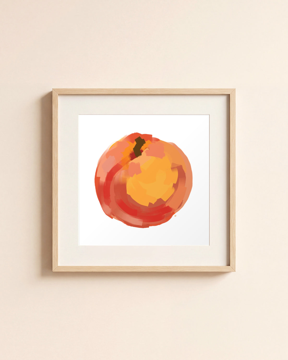 Peach giclée art print in a light oak frame with a white mat, hanging on a cream wall